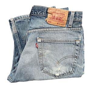 Vintage Levi’s 505 distressed light wash denim size 34/32